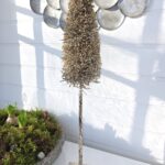 Dekorationsgran i guld med glitter. Besök blickfång.se