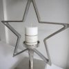 Stjarnformad-ljusstake-i-ruff-silver-1