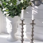 Ljusstake i silver fyra kulor. Besök blickfång.se