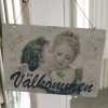 Välkommen skylt med änglar. Besök blickfång.se