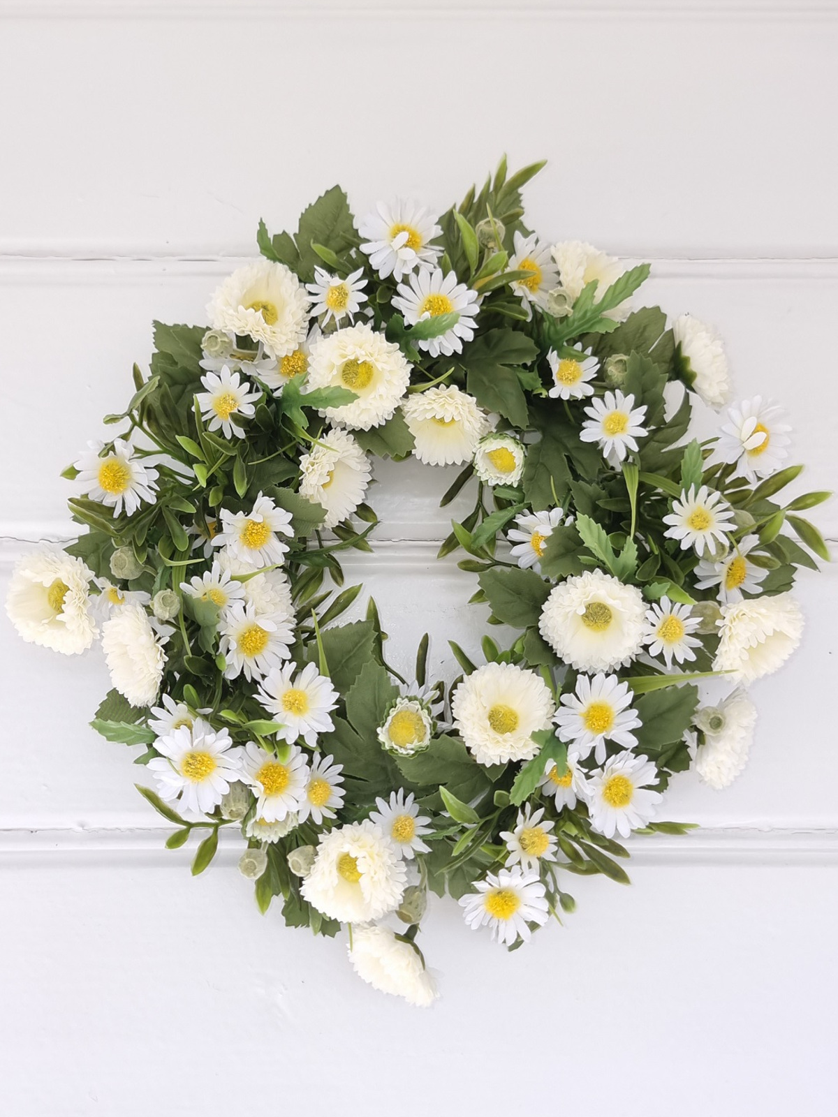 Dörrkrans med vita blommor. Besök blickfång.se