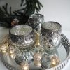 Ljusslinga metallbollar i silver. Besök Blickfång.se