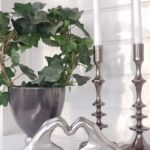 Händer i silver formade som hjärta. Besök blickfång.se
