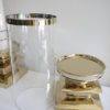 Stor-ljuslykta-i-guld-med-clascylinder-2