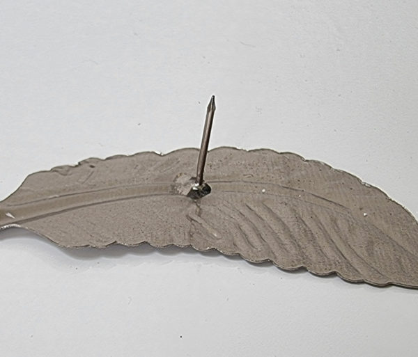 ljussmycker-fjader-i-silver-1