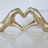 hjartformade-hander-i-guld-2