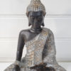 Sittande brun buddha figur. Besök blickfång.se