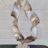 Flame-skulptur- pa-fot-i-silver