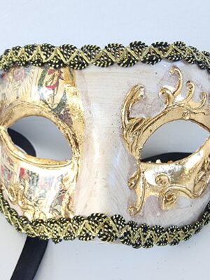 Teater mask med detaljer i guld. Besök blickfång.se