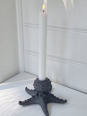 Bläckfisk ljusstake brun svart. Besök Blickfång.se