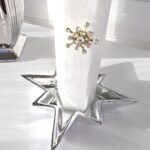 Litet fat stjärna i silver. Besök Blickfång.se