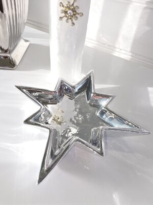 Litet fat stjärna i silver. Besök blickfång.se