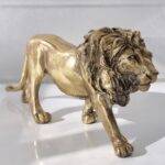 Lejon i guld för dekoration. Besök blickfång.se
