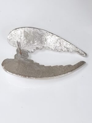 Ljussmycke pin änglavingar i silver. Besök Blickfång.se