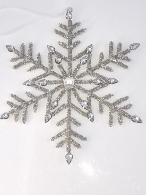 Snöstjärna i silver upphängning. Besök Blickfång.se