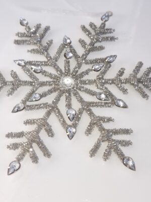 Snöstjärna i silver upphängning. Besök blickfång.se