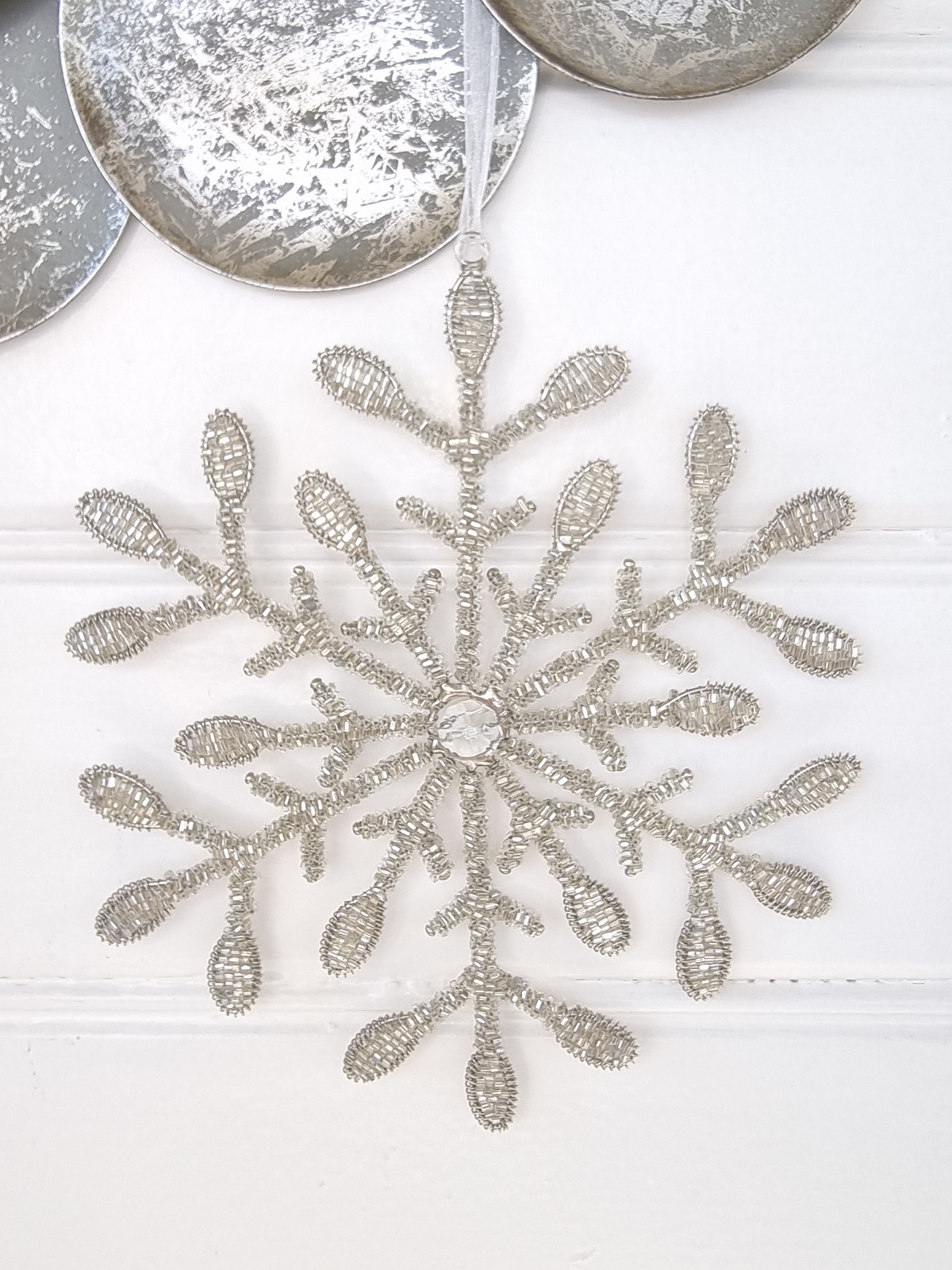 Snöflinga i silver att hänga. Besök blickfång.se
