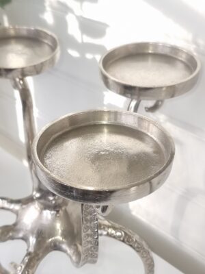 Bläckfisk i silver metall till blockljus. Besök blickfång.se