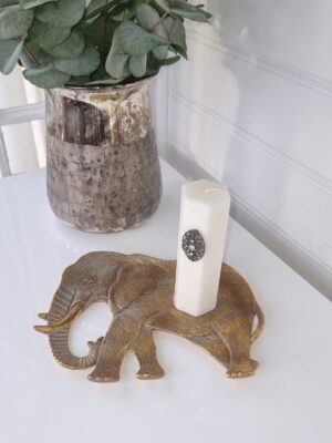 Fat en elefant i guld. Besök blickfång.se