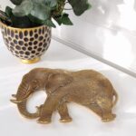 Fat en elefant i guld. Besök Blickfång.se