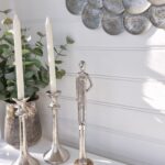 Figur hög smal dam i silver. Besök blickfång.se