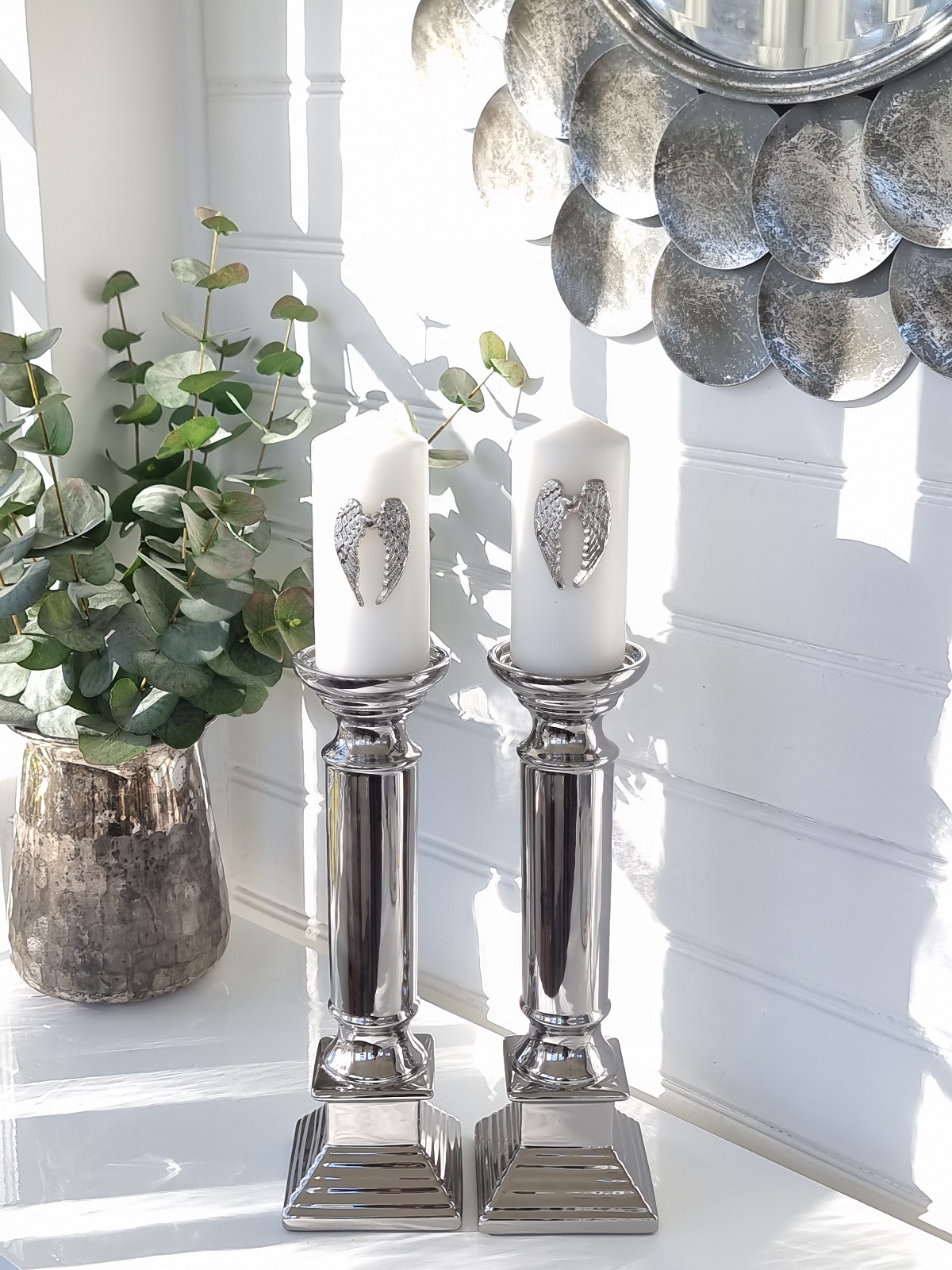 Ljusstake par i silver blockljus kronljus. Besök Blickfång.se