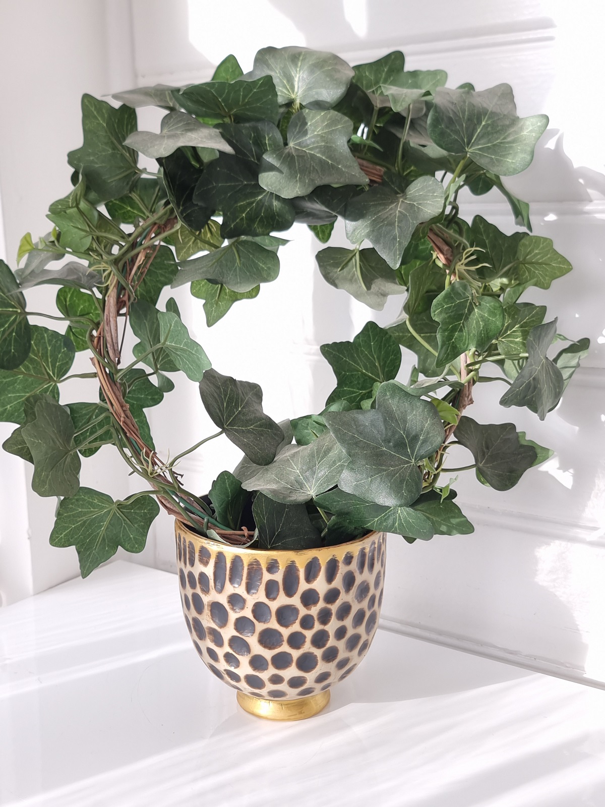 Kruka ytterkruka med leopardmönster. Besök blickfång.se