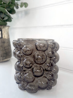 Ljuslykta med bubblor i glas. bwaök Blickfång.se