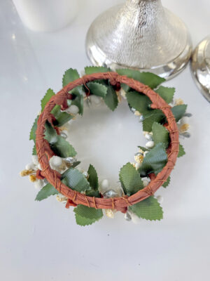 Baksida av en ljusmanschett på brun stomme till blockljus