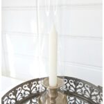 Ljusstake guld med glascylinder. Besök Blickfång.se