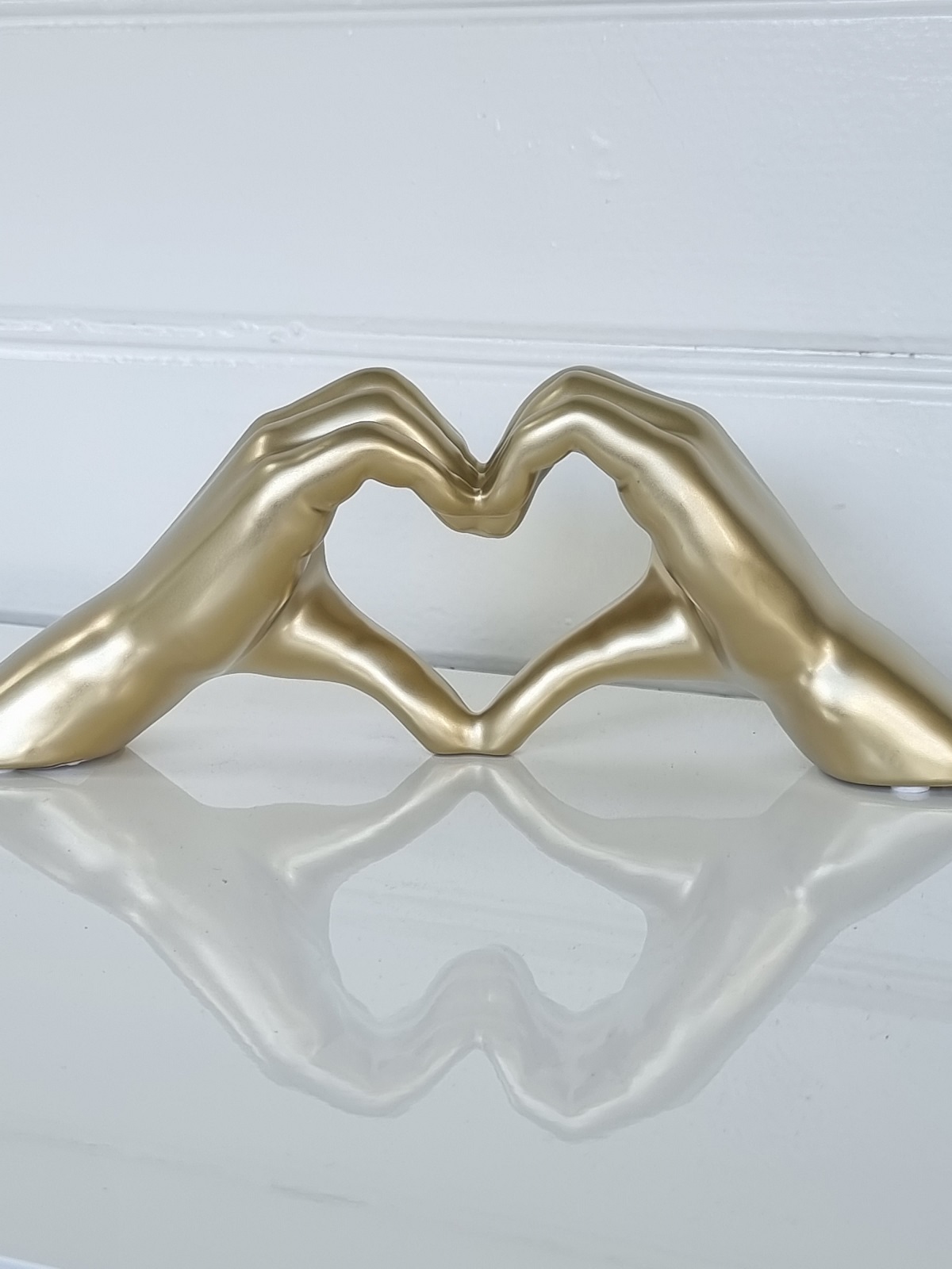 hander-hjartformad-i-guld